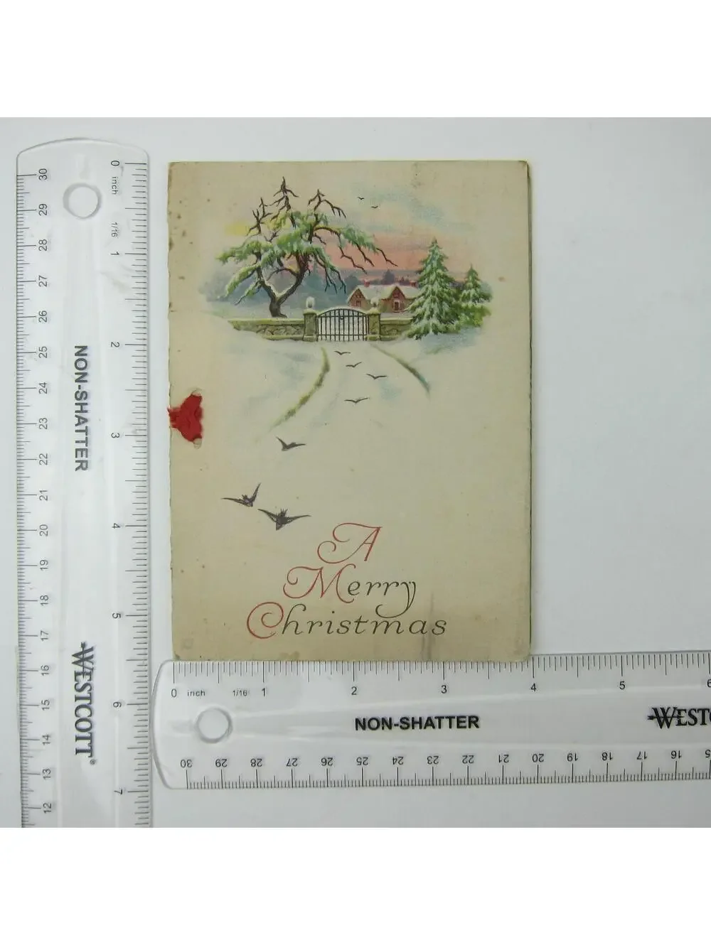 Antique Christmas Card Snowy House Trees Gate Road and Birds Flying Ribbon 1920s